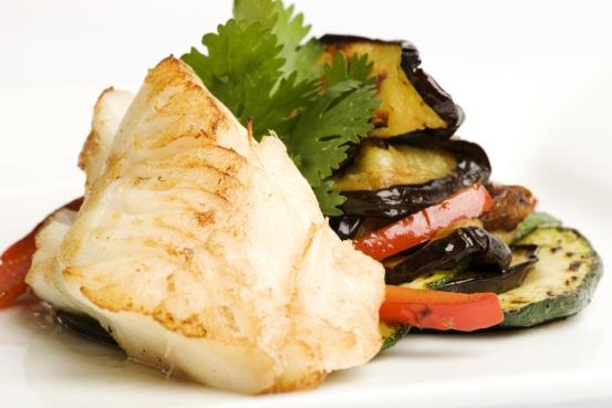 Baccalà con olive taggiasche, melanzane e pachino Baccalà con olive taggiasche, melanzane e pachino