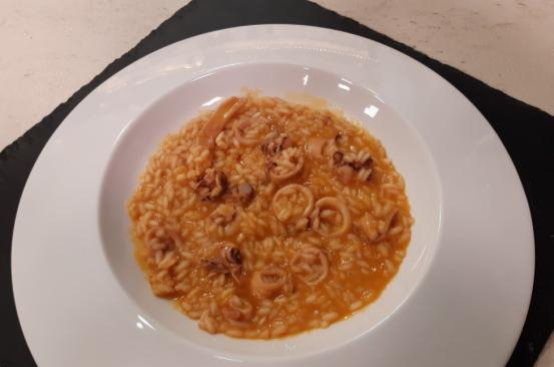 Risotto con calamari e pomodorini gialli Risotto con calamari e pomodorini gialli
